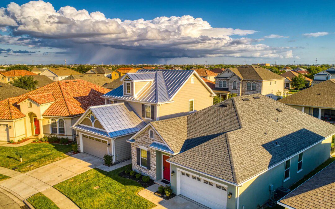 Aerial view of Houston homes with various roof types and styles.