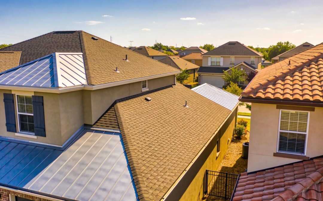 Diverse roofs in a sunny Houston neighborhood, highlighting various roofing materials
